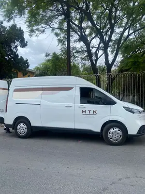 MTK — Manufacture Textile Knitting — van puerta logo