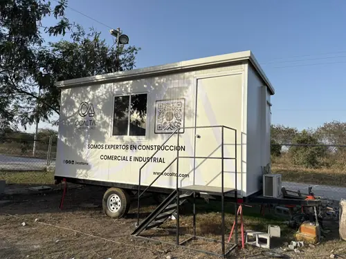 Ocalta Construcciones — traila lateral qr